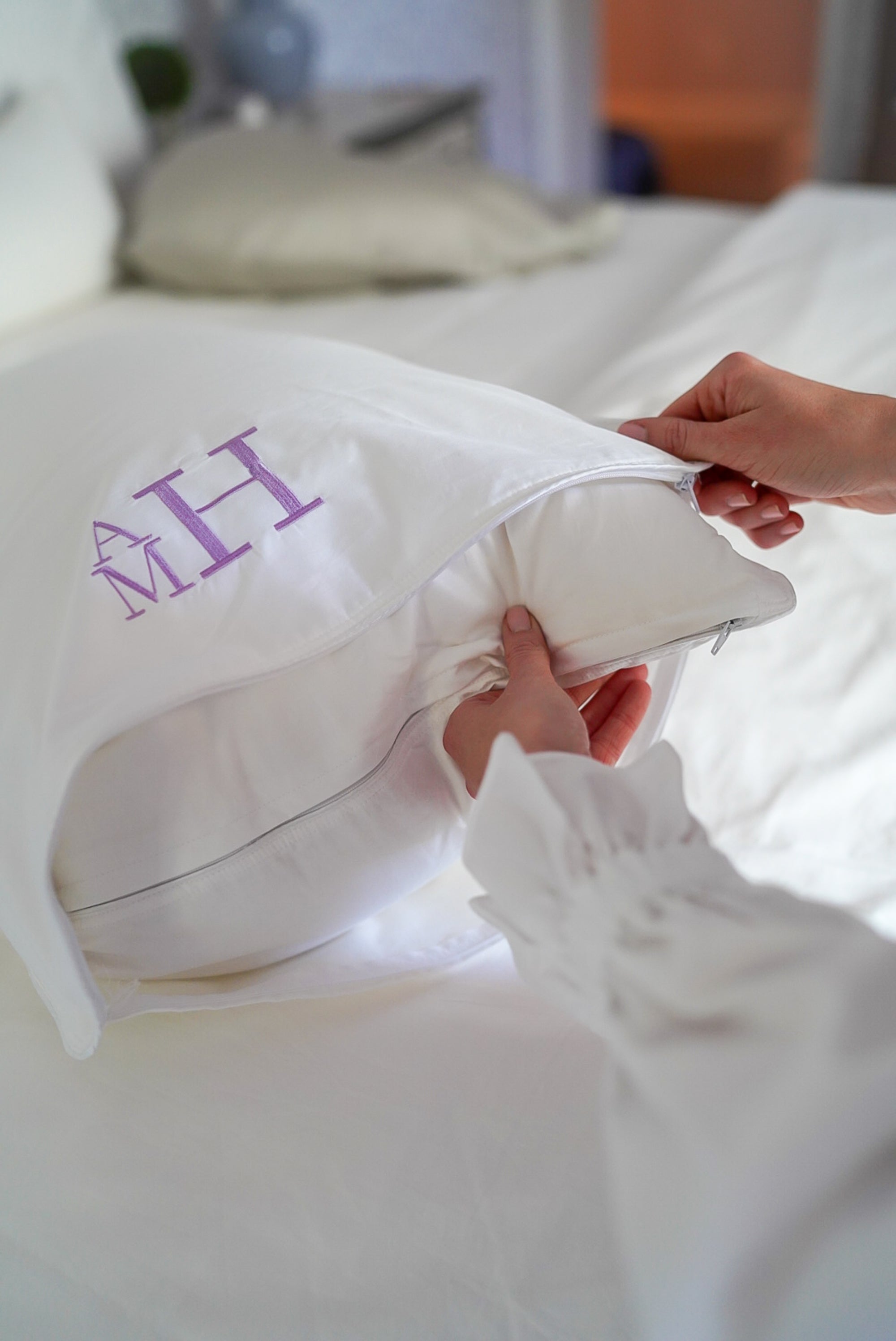 Caption: Monogram style is Stacked Block with Lilac thread.