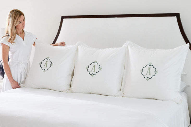 Caption: Euro Shams with Sofia Monogram in Evergreen and Sage thread.