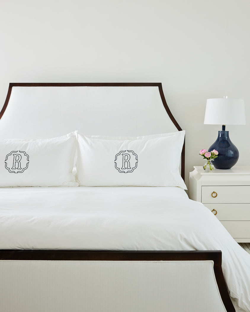 Caption: King Euro Shams with Poppy monogram in Navy thread.