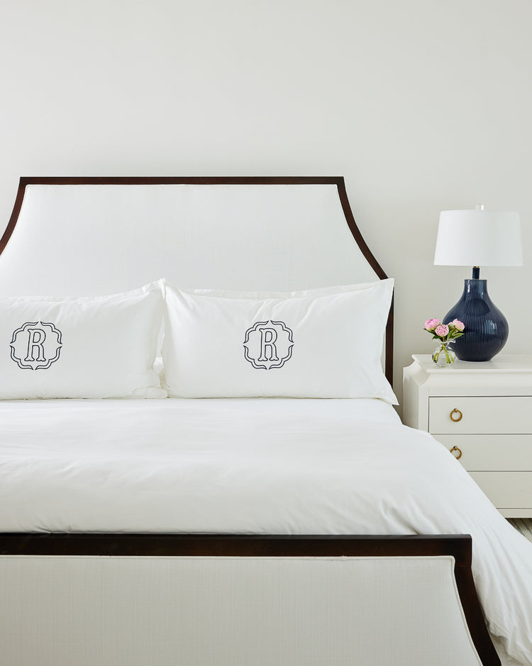 Caption: King Euro Shams with Poppy monogram in Navy thread.