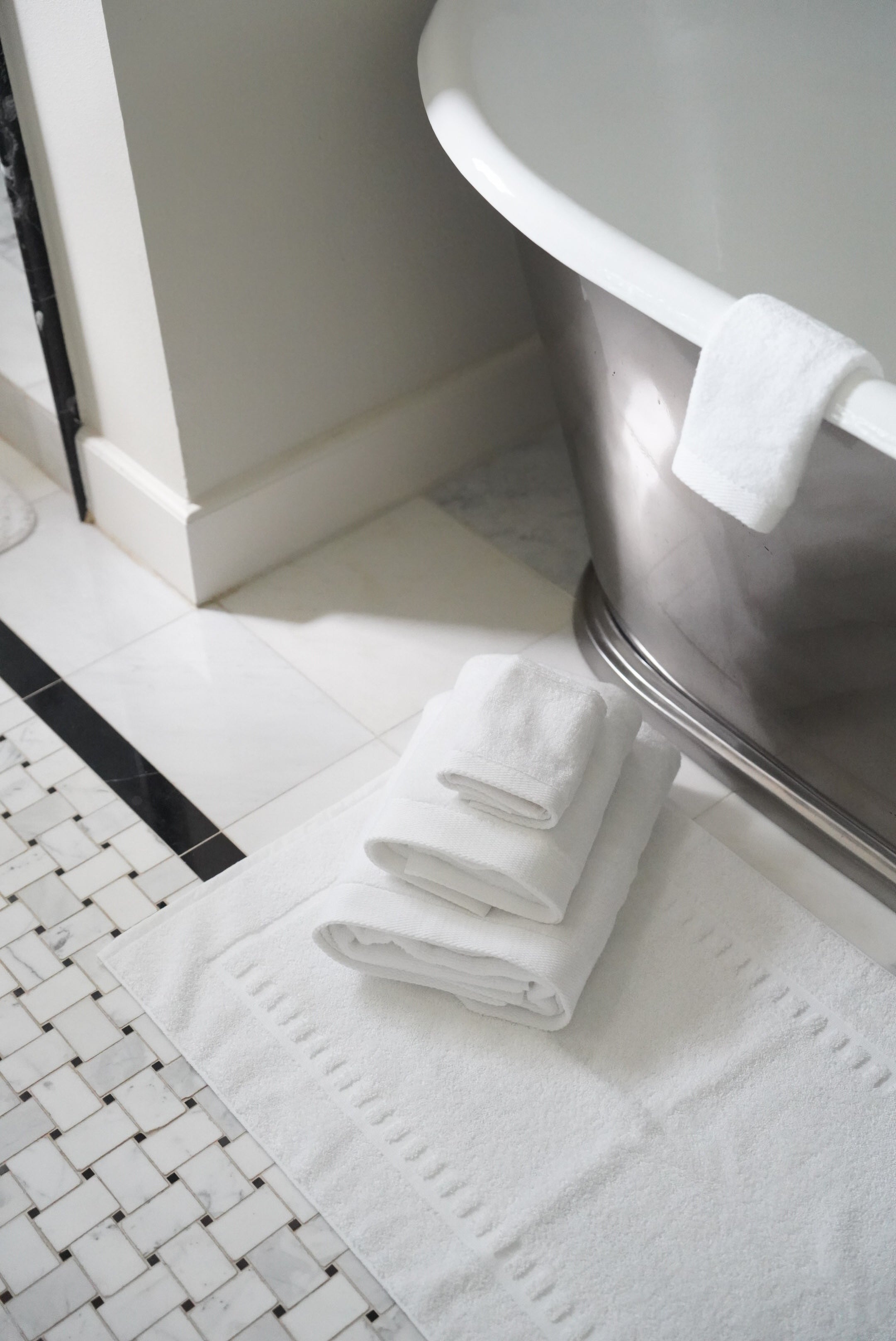 Caption: Bath Mat and the 3-Piece Towel Set.