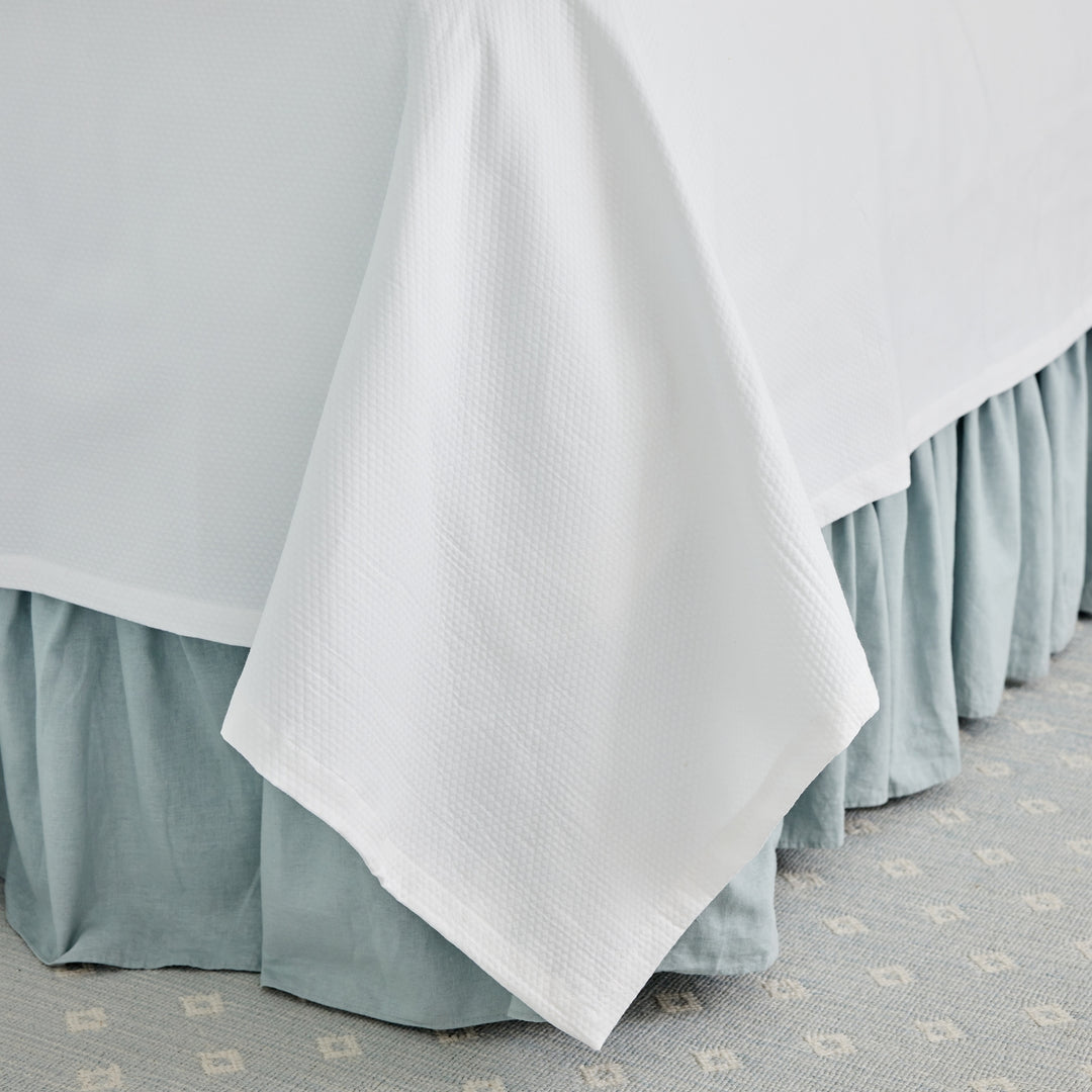 Caption: Diamond Pique Coverlet with Straight Edge finish.