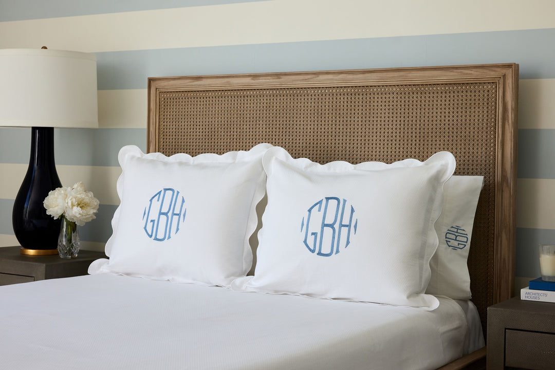 Caption: Standard Shams with White Trim and Asher Monogram in Slate thread.