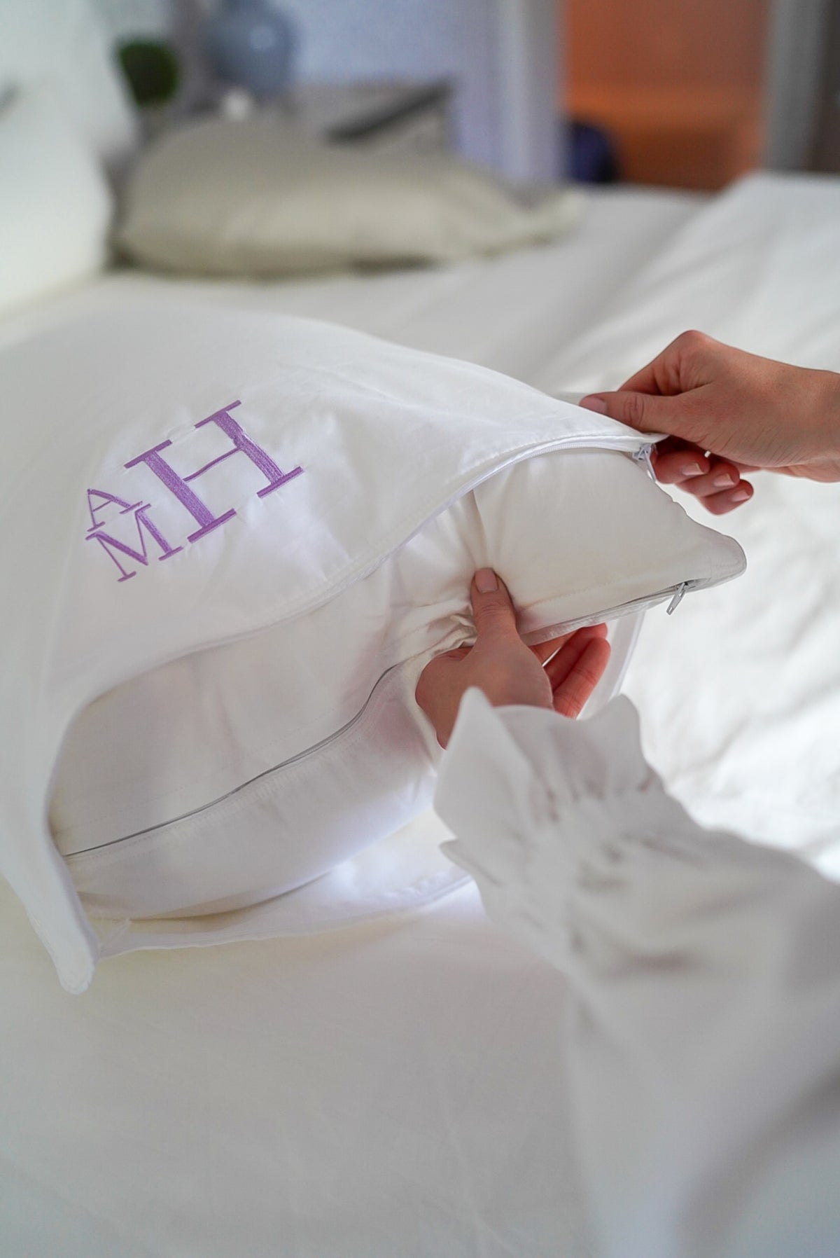 Caption: Monogram style is Stacked Block with Lilac thread.