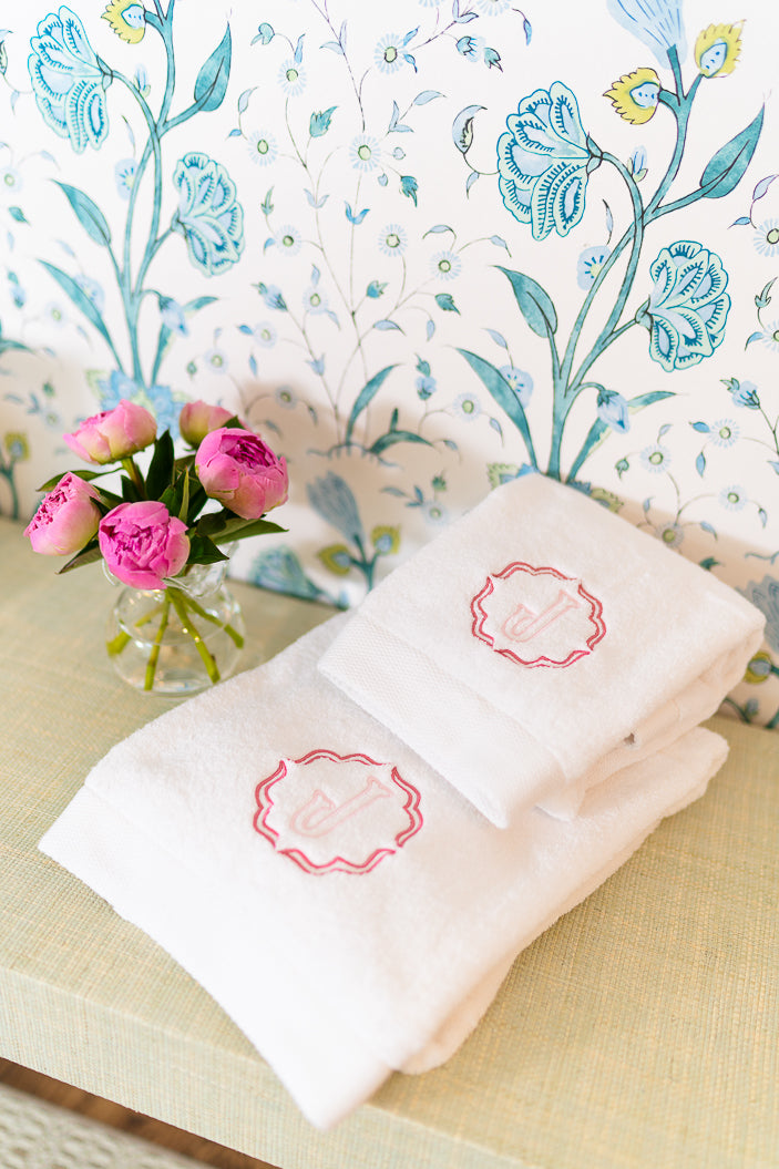 Caption: Monogram style is Poppy with Hibiscus and Light Pink thread.